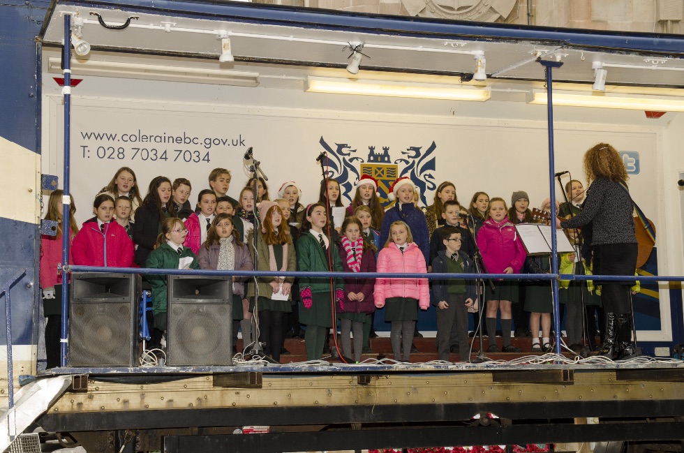 Saint John\'s Carol Singers entertain at Town Hall